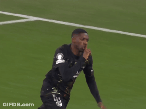 Soccer Player In Black Jersey Number 11 GIF