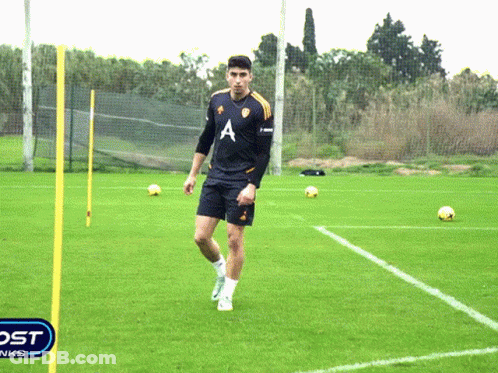 Soccer Player In Black Jersey With Letter A GIF