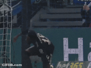 Soccer Player In Black Jersey With Letter T GIF