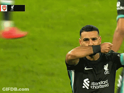 Soccer Player In Black Liverpool Shirt GIF