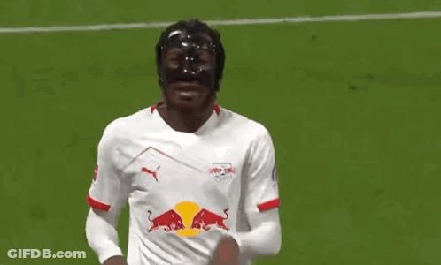 Soccer Player In Black Mask And Red Bull Jersey GIF