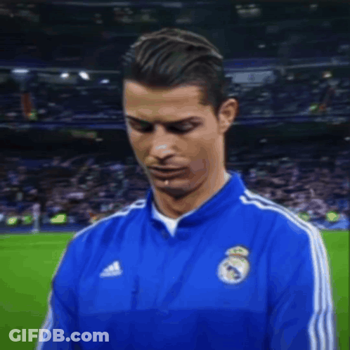 Soccer Player In Blue Adidas Jacket Smiles GIF