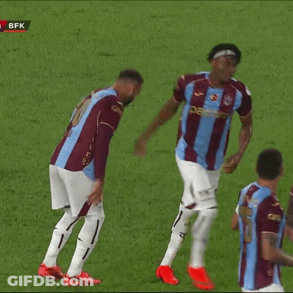 Soccer Player In Blue And Maroon Jersey Running GIF