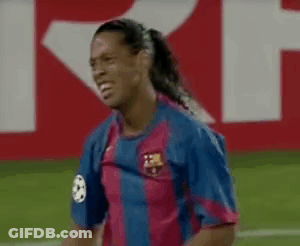 Soccer Player In Blue And Pink Jersey Number 8 GIF