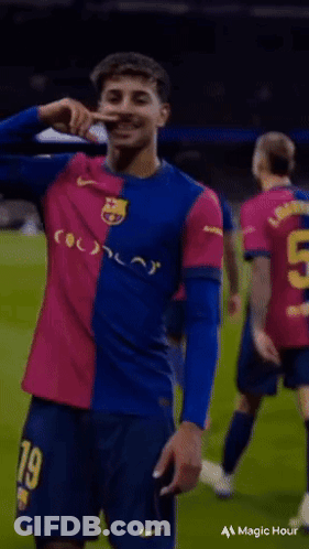 Soccer Player In Blue And Pink Jersey Number 9 GIF