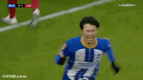 Soccer Player In Blue And White Jersey Celebrating Goal GIF