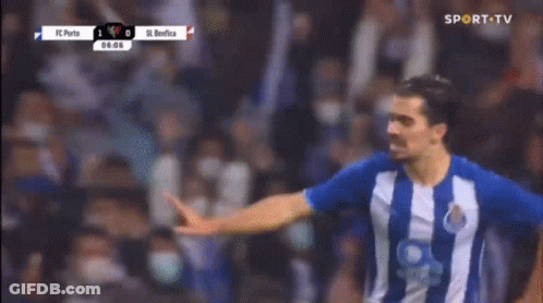 Soccer Player In Blue And White Striped Shirt Celebrating Goal GIF