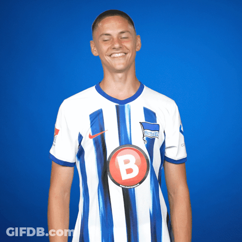 Soccer Player In Blue And White Striped Shirt With B GIF