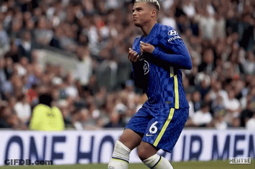 Soccer Player In Blue And Yellow Jersey Number 6 GIF