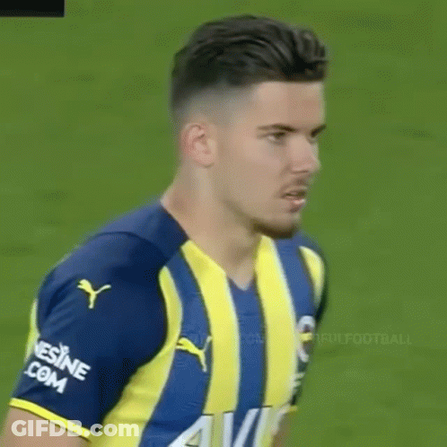 Soccer Player In Blue And Yellow Striped Shirt GIF
