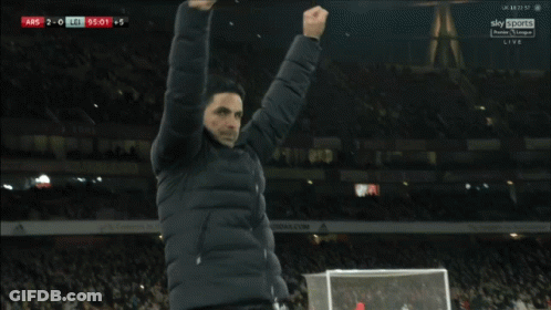 Soccer Player In Blue Emirates Shirt In Front Of Sign GIF