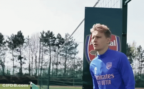 Soccer Player In Blue Emirates Shirt On Field GIF
