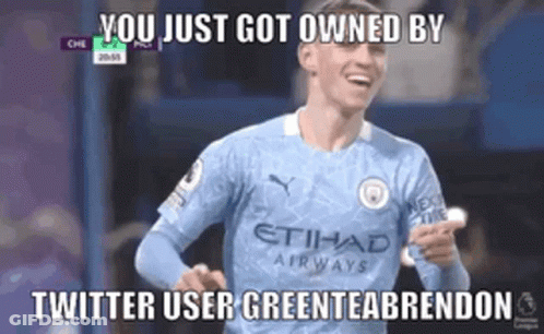 Soccer Player In Blue Etihad Airways Jersey Smiling And Pointing GIF