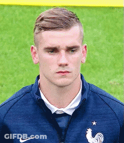 Soccer Player In Blue Jacket With Rooster GIF