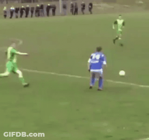 Soccer Player In Blue Jersey Kicking Ball GIF
