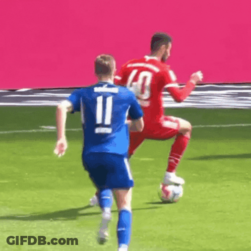 Soccer Player In Blue Jersey Number 11 Kicking Ball GIF