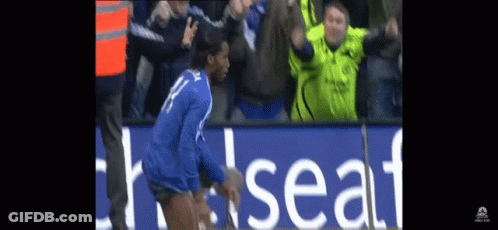 Soccer Player In Blue Jersey Number 12 GIF