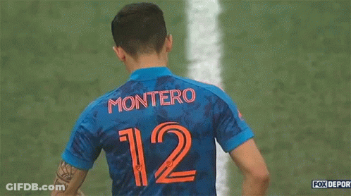 Soccer Player In Blue Jersey Number 12 GIF