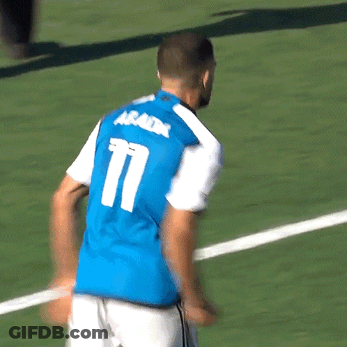 Soccer Player In Blue Jersey Number 12 GIF