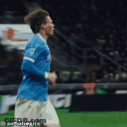 Soccer Player In Blue Jersey Number 12 GIF
