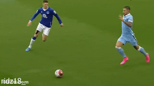 Soccer Player In Blue Jersey Number 18 GIF