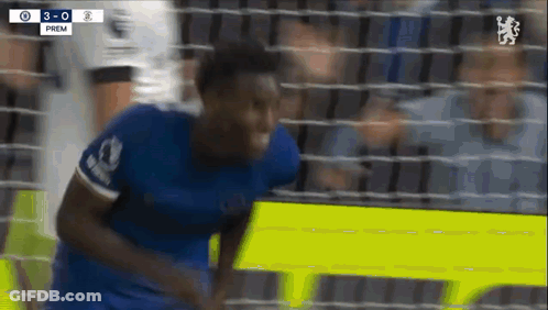 Soccer Player In Blue Jersey Running Towards Goal GIF