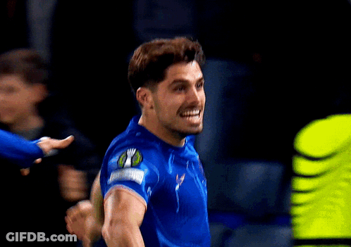 Soccer Player In Blue Jersey With Captain Patch GIF