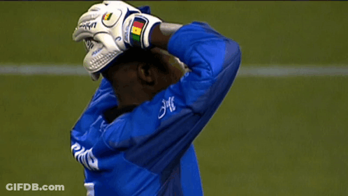 Soccer Player In Blue Jersey With JMC On Sleeve GIF