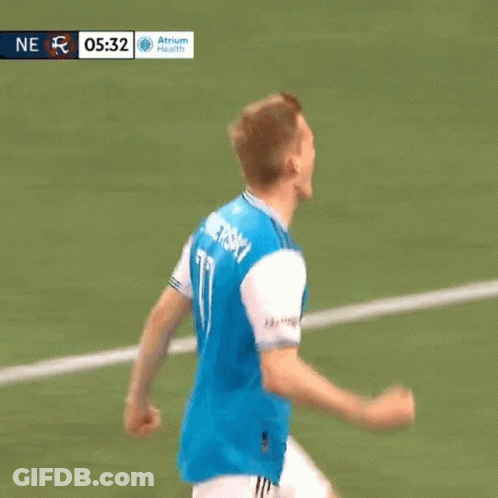 Soccer Player In Blue Jersey With Qatar Tackled GIF