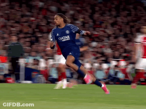 Soccer Player In Blue Qatar Jersey Runs GIF