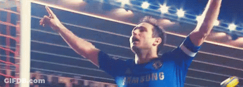Soccer Player In Blue Samsung Jersey Raising Arms GIF