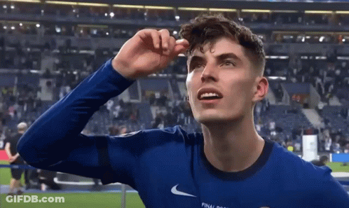 Soccer Player In Blue Shirt Looking Up GIF