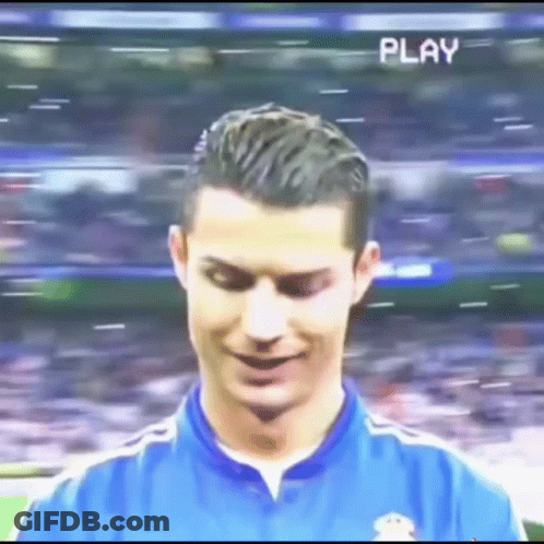 Soccer Player In Blue Shirt Smiling With Play GIF