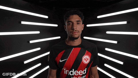 Soccer Player In Blue Shirt With OK On Sleeve GIF