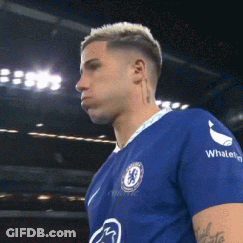 Soccer Player In Blue Shirt With Whalefin On Sleeves GIF