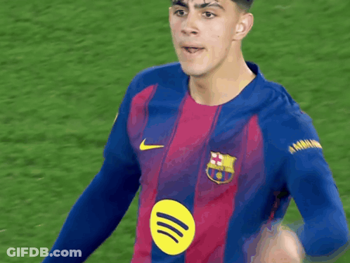 Soccer Player In Blue Shirt With Yellow Circle GIF