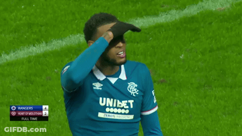 Soccer Player In Blue Unibet Jersey Covering Eyes GIF