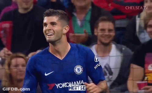 Soccer Player In Blue Yokohama Jersey Smiling GIF