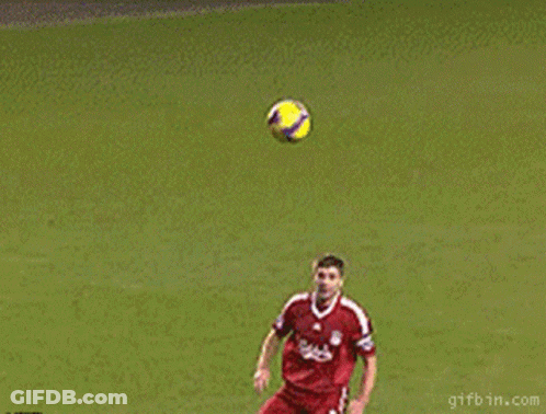 Soccer Player In Carlsberg Jersey Ready To Kick Ball GIF