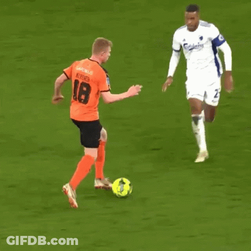 Soccer Player In Carlsberg Jersey Running To Ball GIF