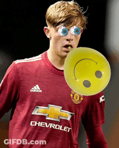 Soccer Player In Chevrolet Jersey Holding Smiley GIF