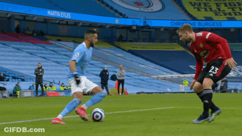Soccer Player In City Jersey Kicking Ball GIF