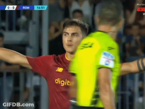 Soccer Player In Digital Jersey Next To Referee GIF