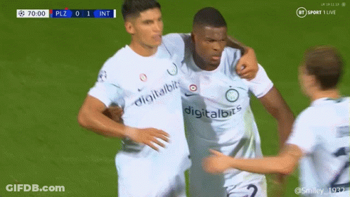 Soccer Player In Digitalbits Jersey Hugging Another Player GIF
