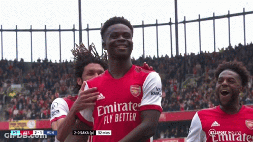 Soccer Player In Emirates Fly Better Jersey Celebrates Goal GIF