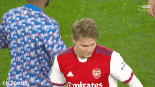 Soccer Player In Emirates Fly Better Jersey Helped Off Field GIF