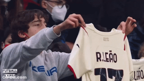 Soccer Player In Emirates Fly Better Jersey Making Heart GIF