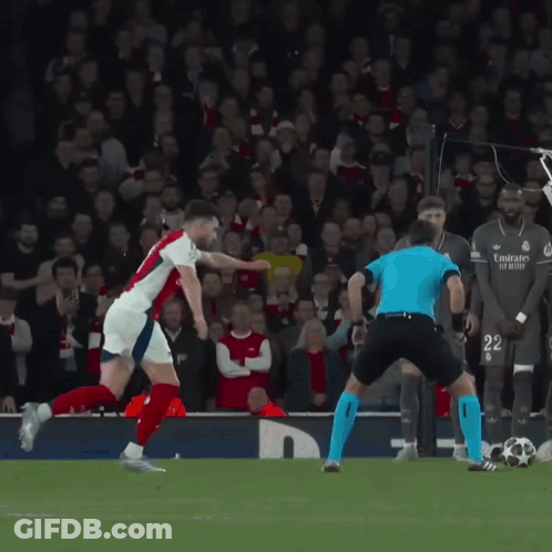 Soccer Player In Emirates Jersey Kicking Ball GIF