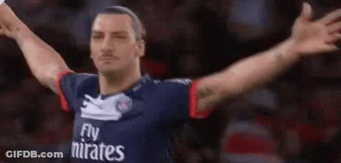 Soccer Player In Fly Emirates Jersey Arms Outstretched GIF