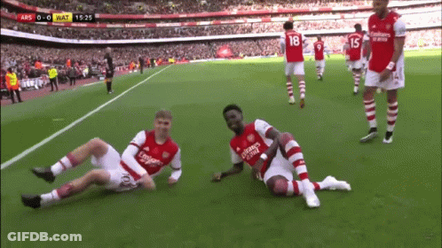 Soccer Player In Fly Emirates Jersey Lying GIF
